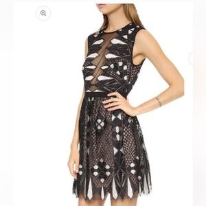 BCBG Max Azaria Kailey black and sheer mini dress